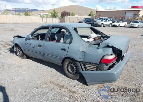 1996 Toyota Corolla Dx z USA, uszkodzony, nr VIN 1NXBB02E4TZ396521